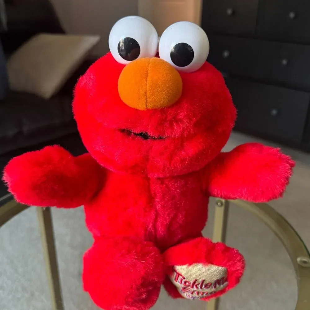 Sesame Street Tickle Me Elmo Surprise 13